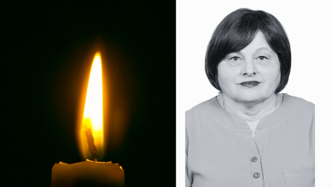 Attēlā redzama tiesnese un sveces liesma